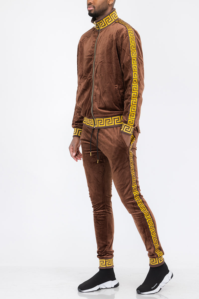 Brown tracksuit with yellow patterns on a white background