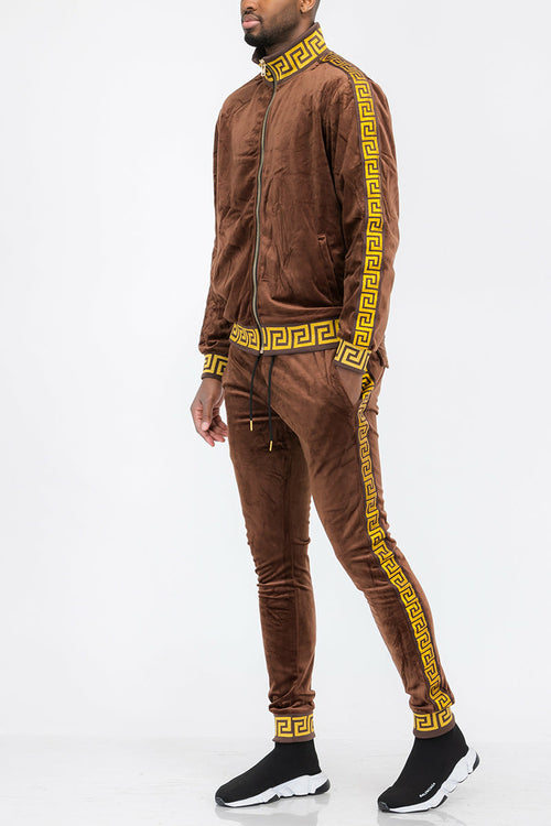 Brown tracksuit with yellow patterns on a white background